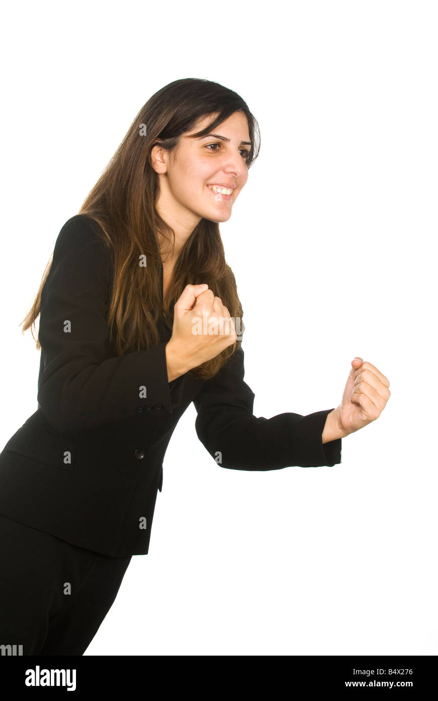 Successful Business Woman Clenching Fists Stock Photo Alamy