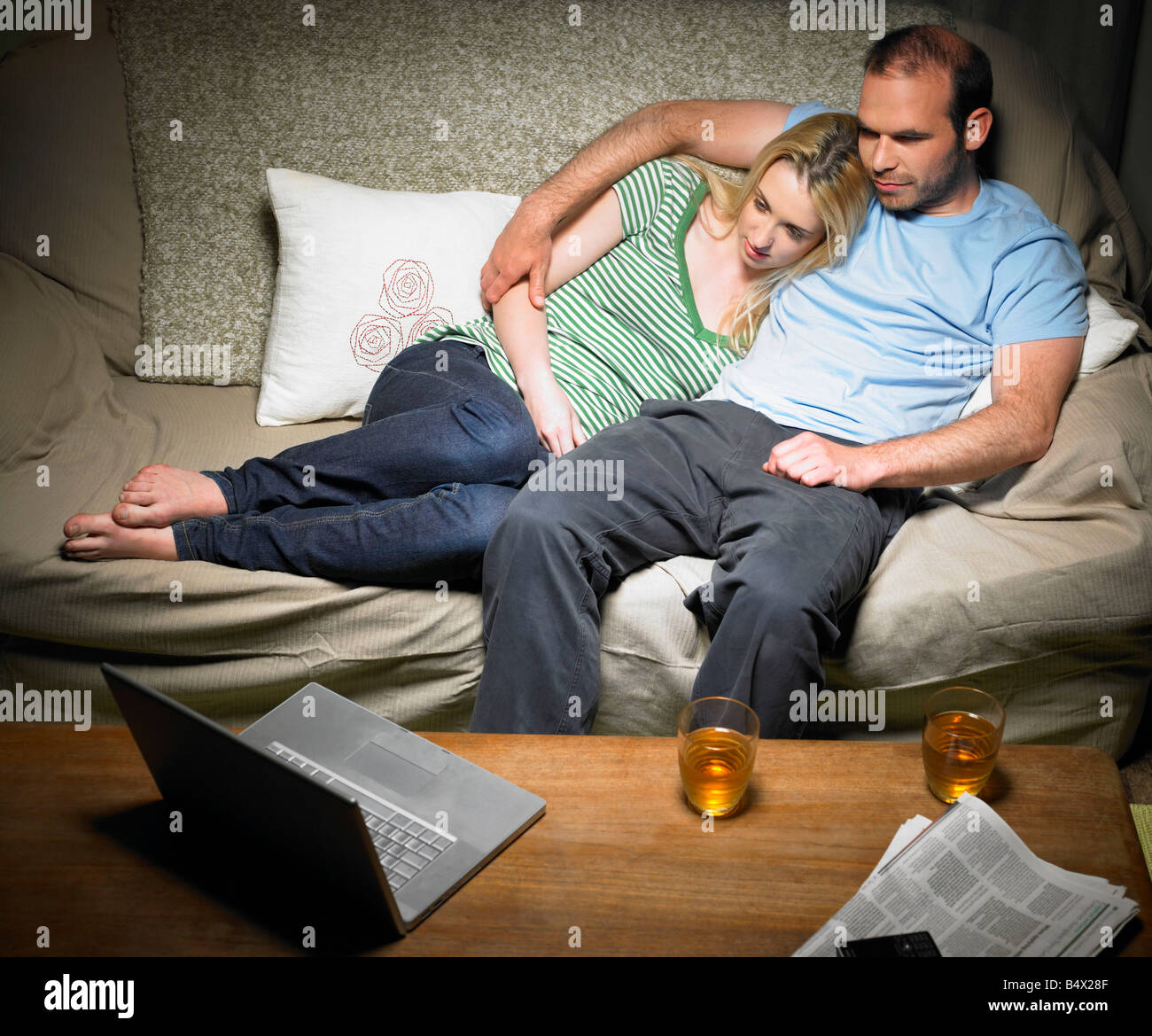 Young couple watching a movie Stock Photo