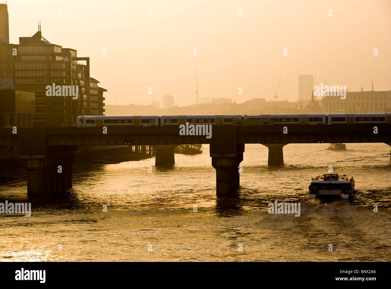 London skyline on the river thames at sunset Stock Photo