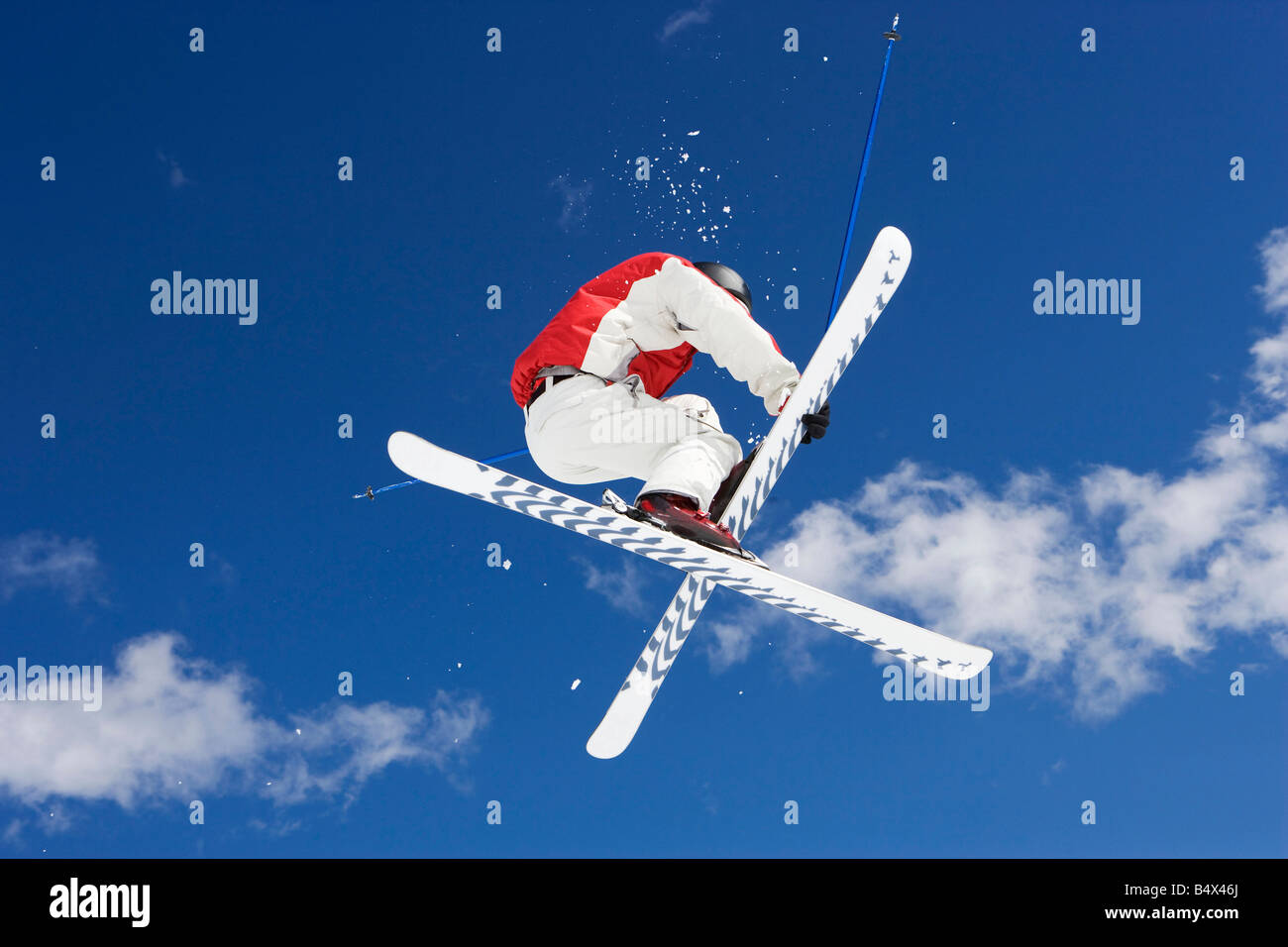Skier performing jumping trick Stock Photo Alamy