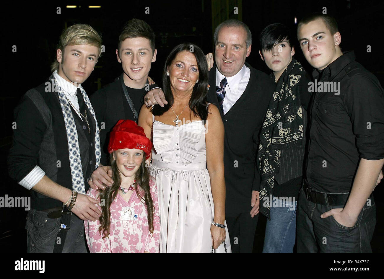 Parents of Michael Shields Michael snr and Marie with their grand daughter Kelsea meet the band Eaton Road before benefit gig in Liverpool December 4th 2006 Stock Photo