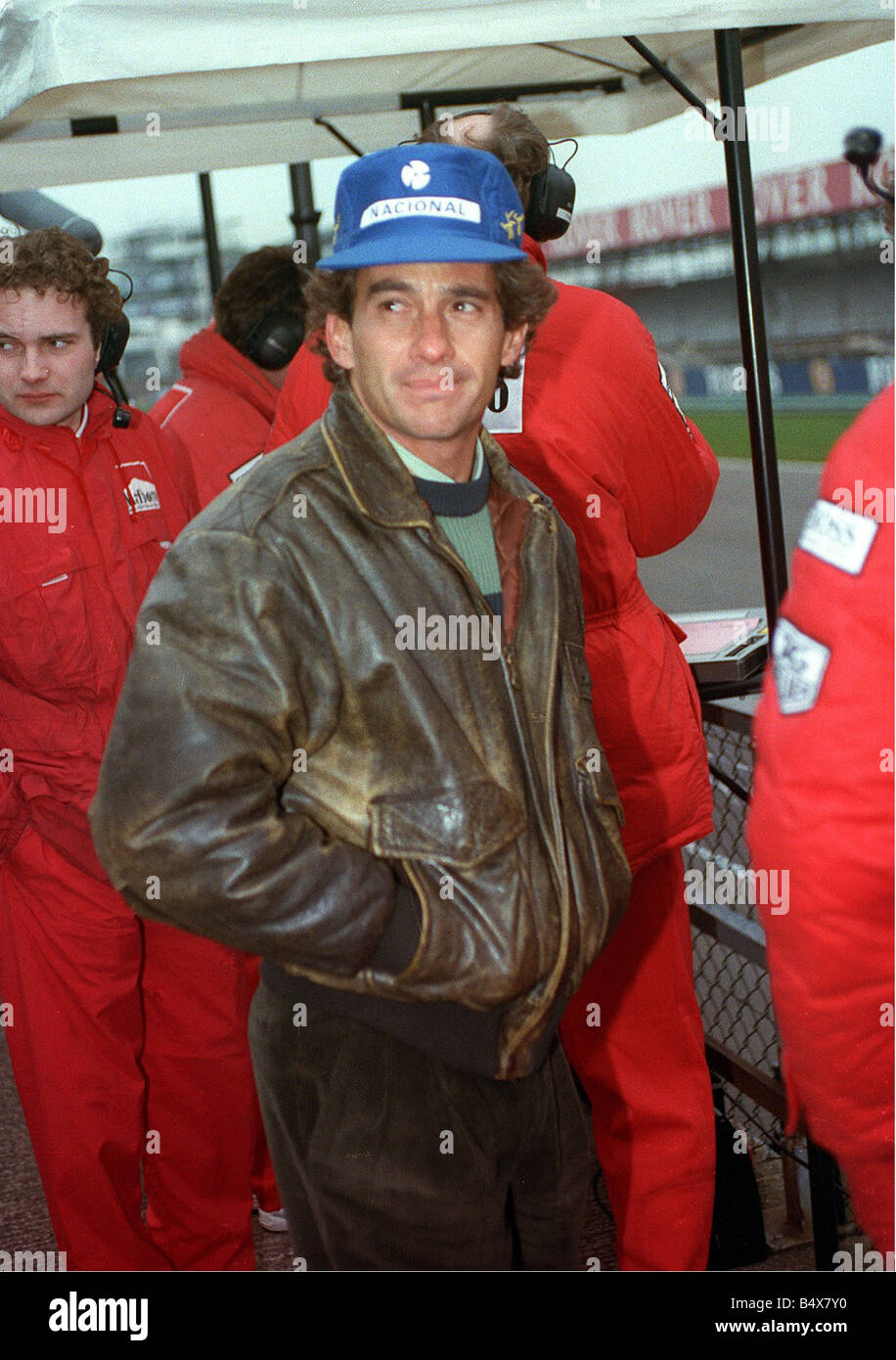 Formula 1 Silverstone Practice session March 1993 Racing driver Ayrton Senna  casually walks round the pits Brown leather jacket Stock Photo - Alamy