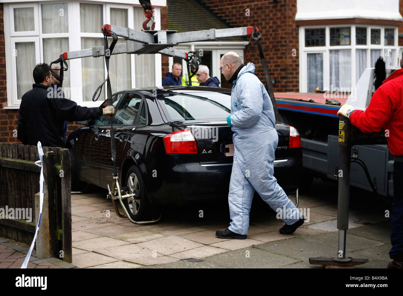 Police take away car from Elmridge Road, Kingstanding, Birmingham, beleived to be the home of a