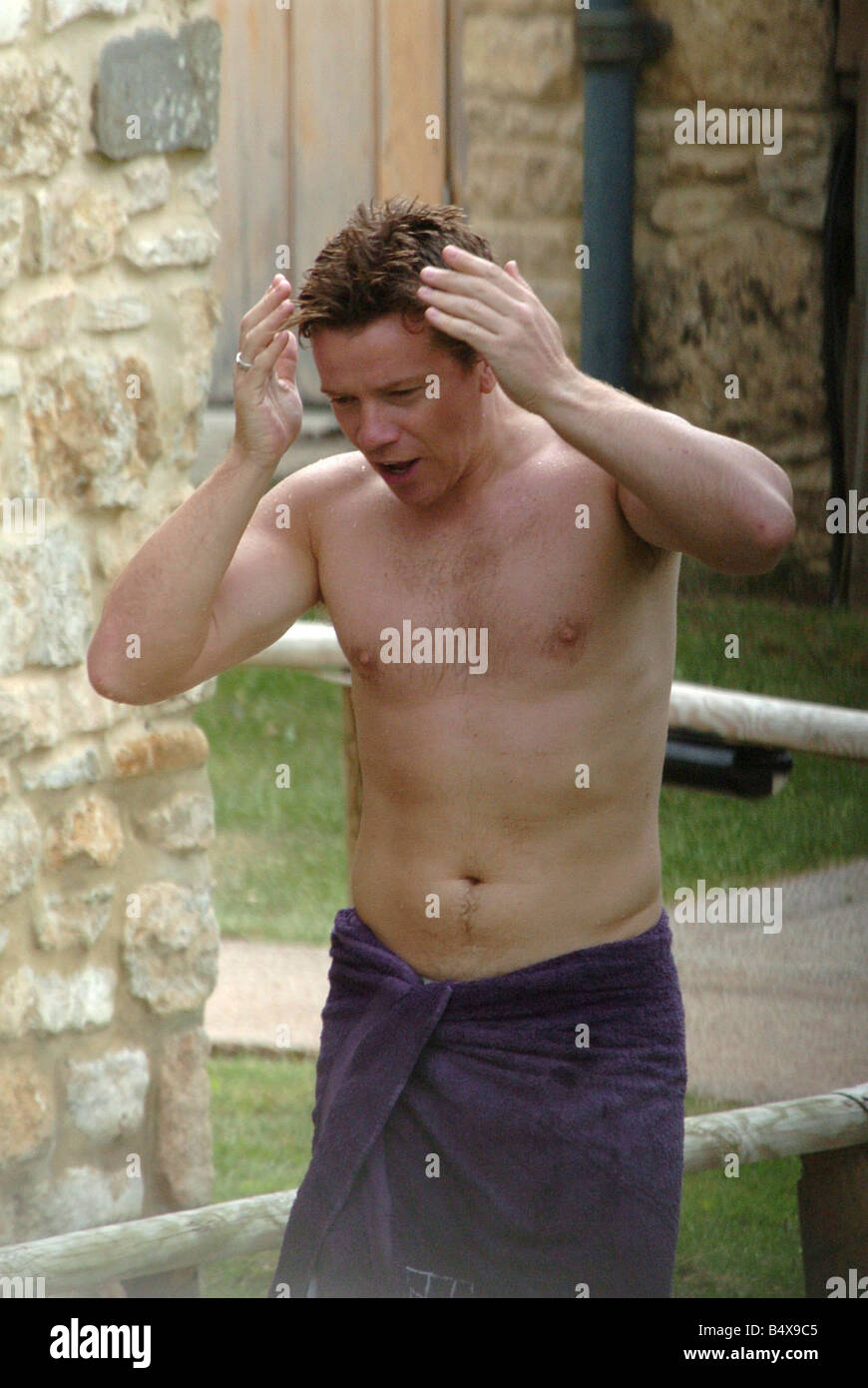 Max Beasley wearing his Man Utd swimming shorts by the pool of the Babington House Hotel in