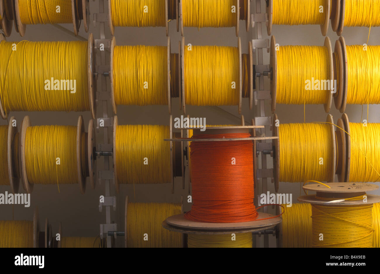 yellow fiber optic cables orange spool Stock Photo Alamy