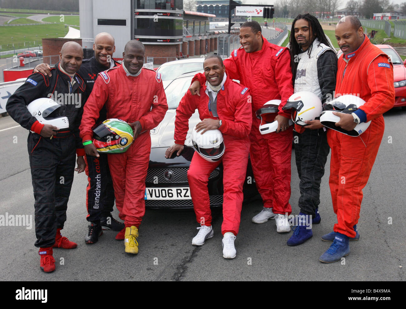 Drivers including ex footballers, try out for the first Caribbeen Racing Team at Brands Hatch today. L-R Luther Bissett, Tony Chambers, Raun Austin, Les Ferdinand, John Barnes, Olevi Doctrove and Winston Graham. They are sitting on a Jaguar.;29th January 2007 Stock Photo