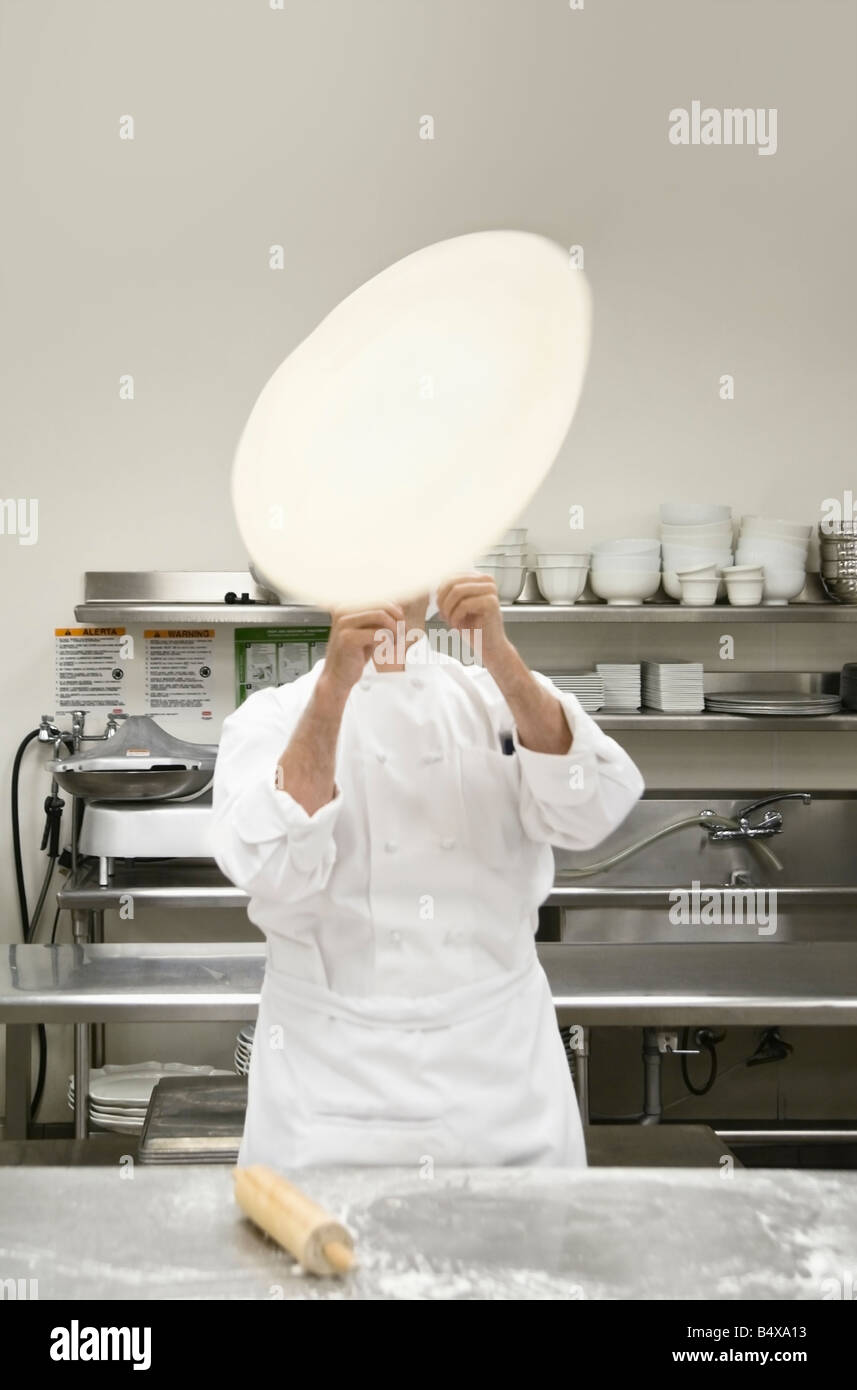 Chef tossing pizza dough Stock Photo Alamy