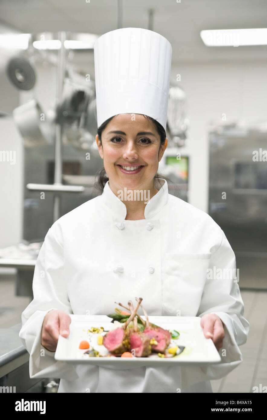 Chef presenting gourmet entree Stock Photo Alamy