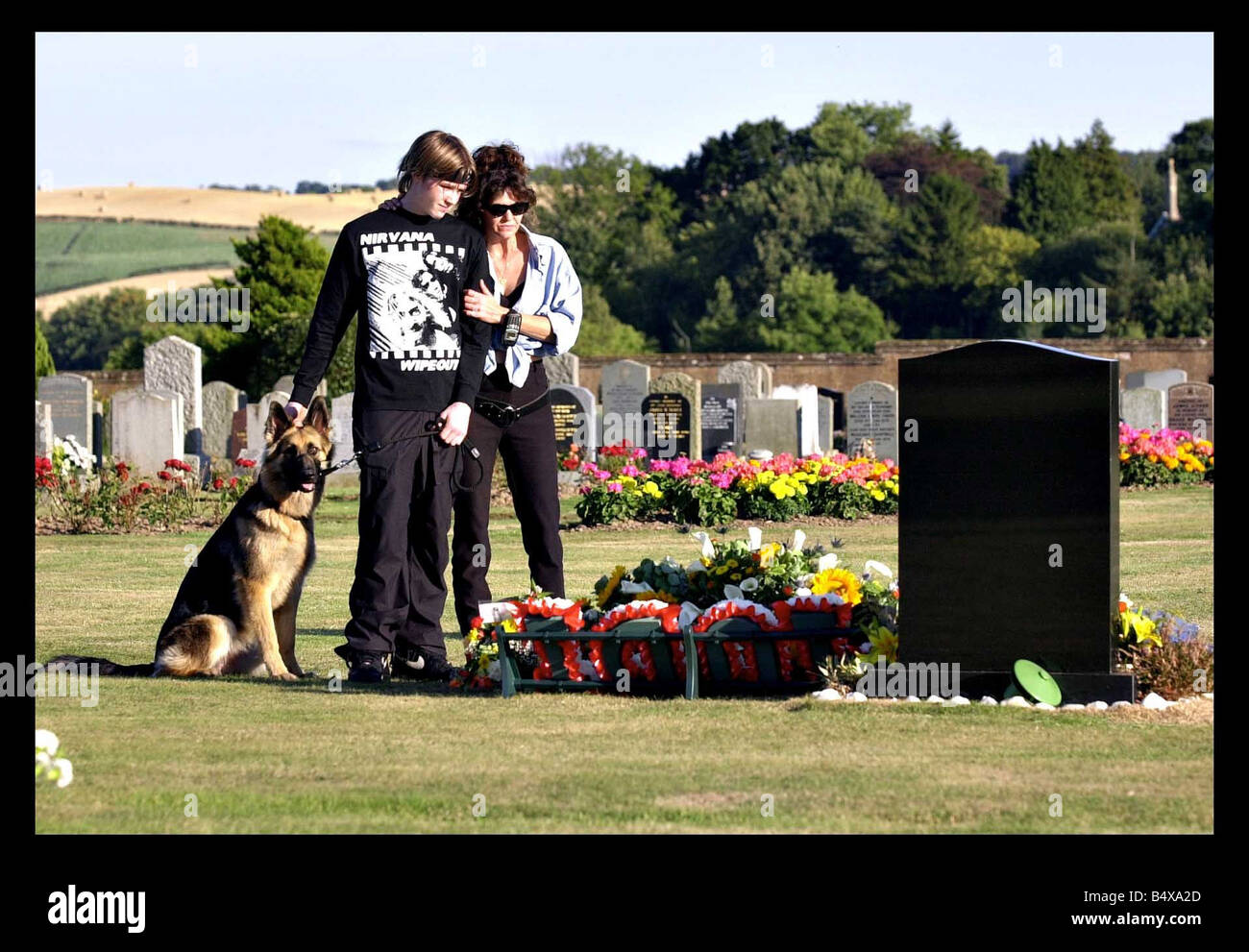 Luke Mitchell and his mother Corinne visit the grave of murdered girlfriend Kimberley Thompson Luke was later convicted of her murder and is serving a minimum of 20 years imprisonment l Stock Photo