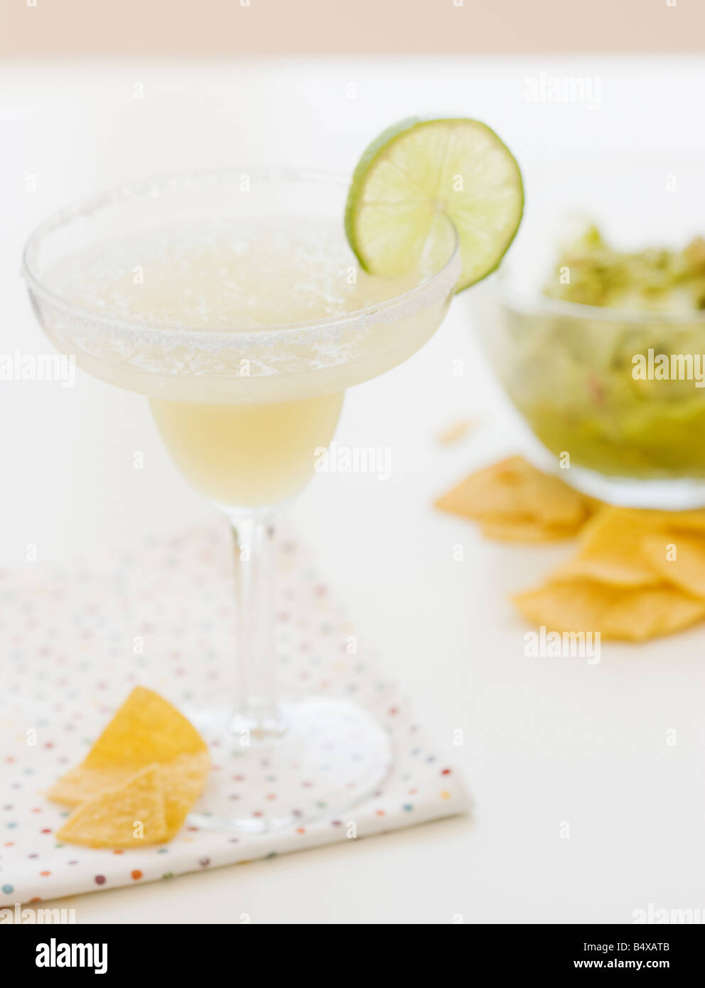 Lime margarita, tortilla chips and guacamole Stock Photo Alamy