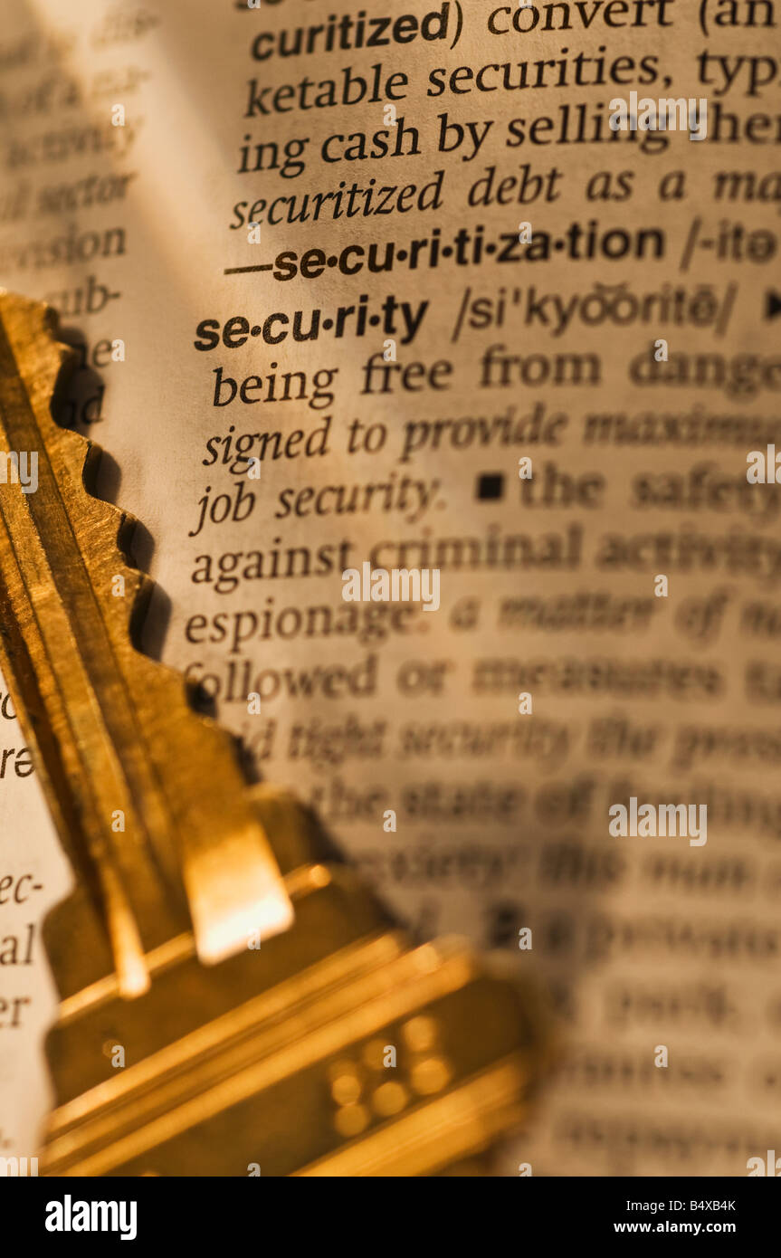 Definition of security in dictionary and key Stock Photo Alamy
