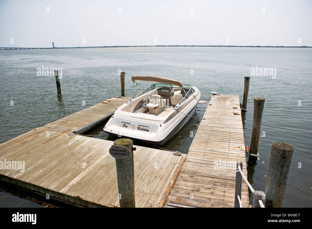 Boat moored at dock Stock Photo - Alamy