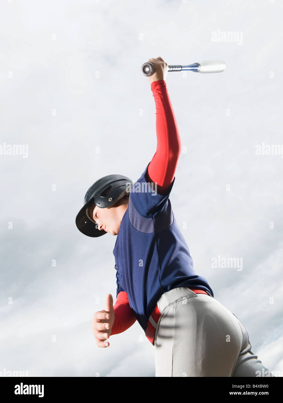 Baseball player swinging bat Stock Photo Alamy