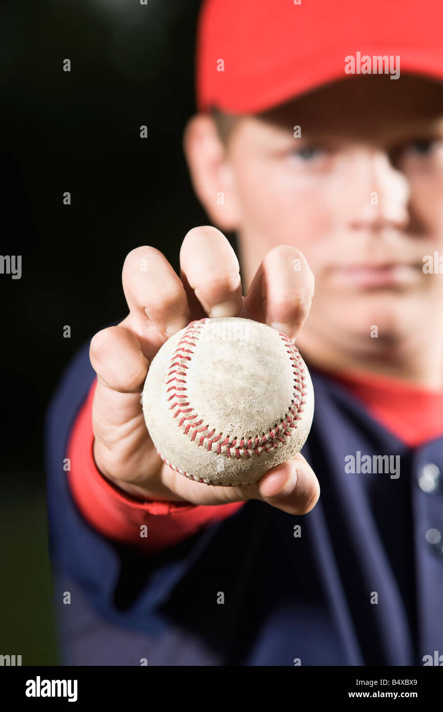 Baseball pitcher holding ball Stock Photo Alamy