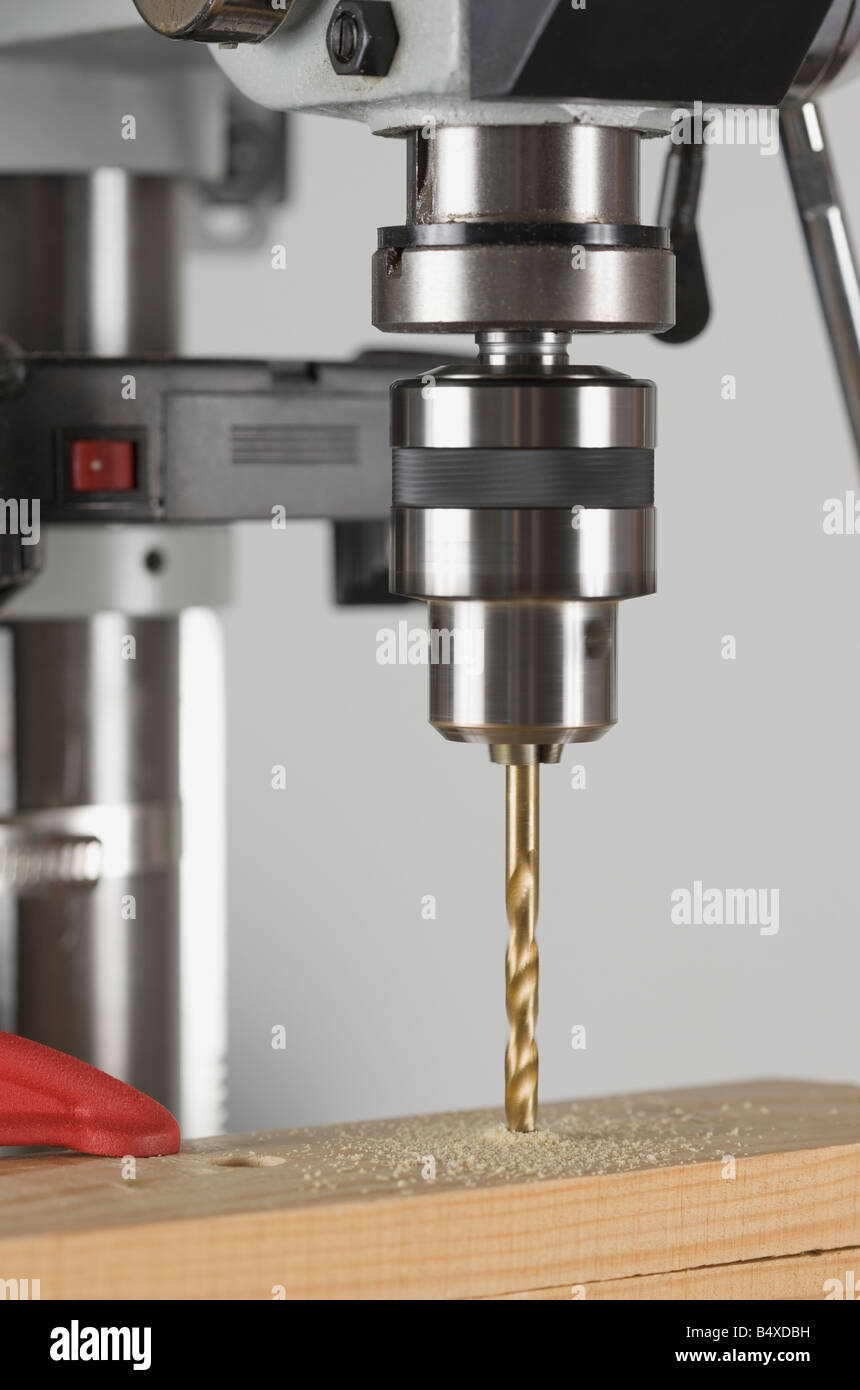 Drill press and wood Stock Photo Alamy