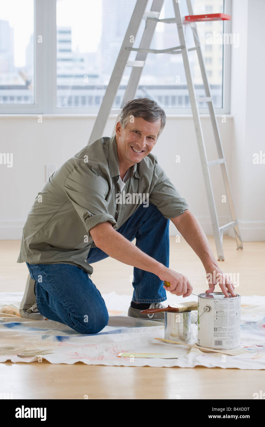 Man painting room Stock Photo - Alamy
