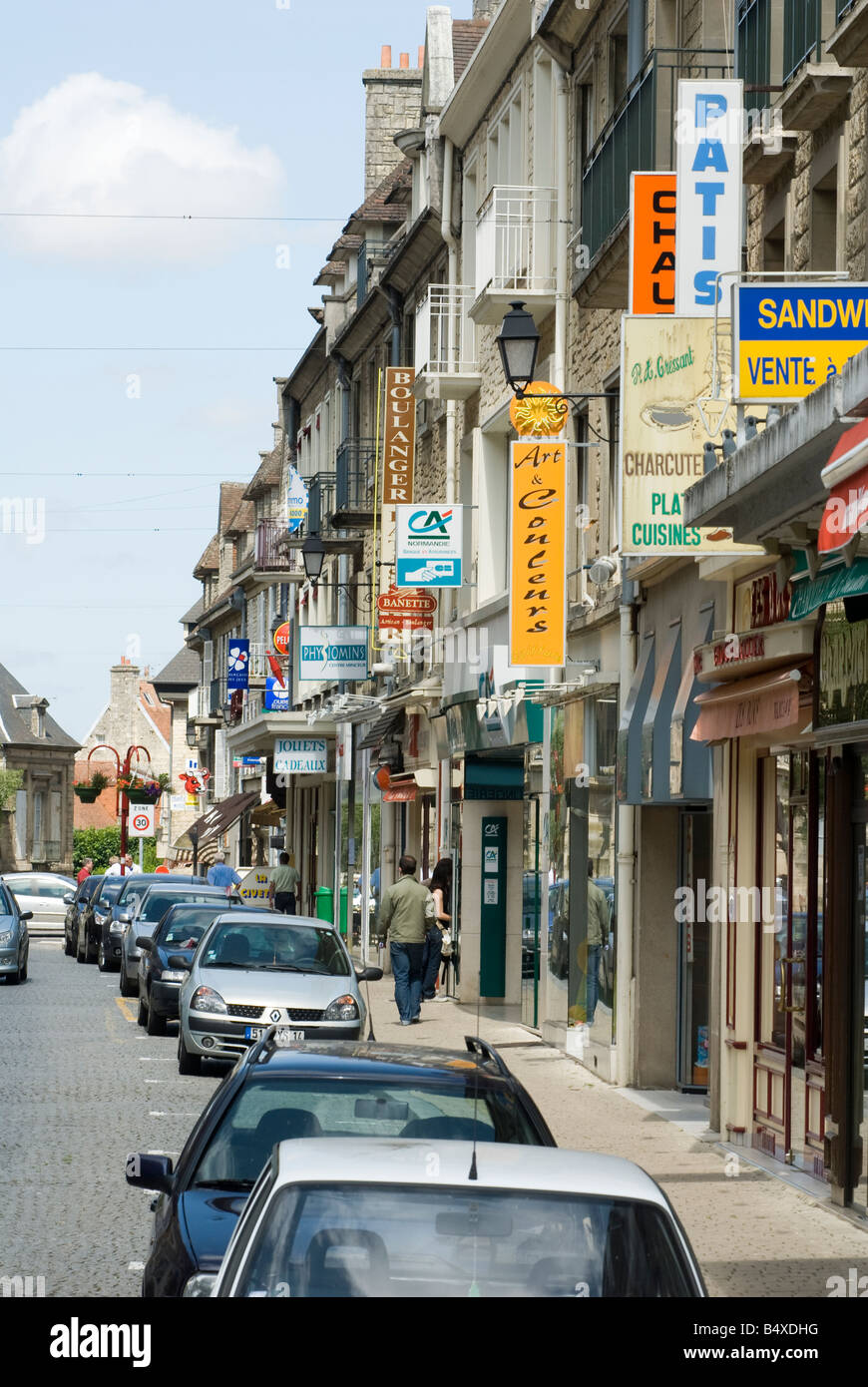 Cars parked in a street in the french town of Falaise Normandy France