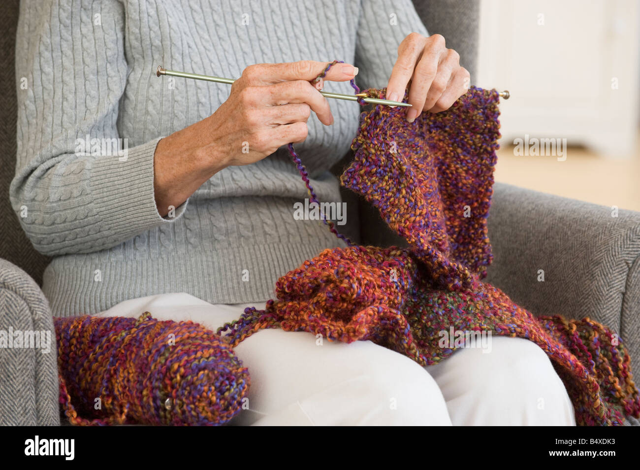 Senior woman knitting Stock Photo Alamy
