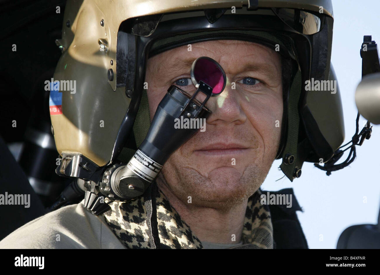 Celebrity Chef Gordon Ramsay inside the cockpit of an Apache helicopter at Camp Bastion Helmand Province Afghanistan he s there Stock Photo