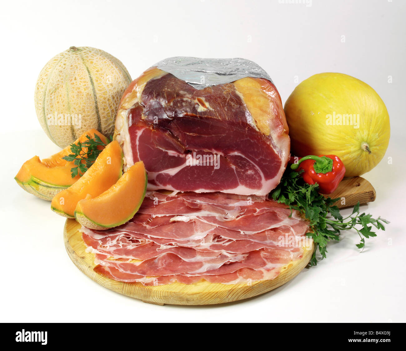 sliced ham on cutting board Stock Photo Alamy