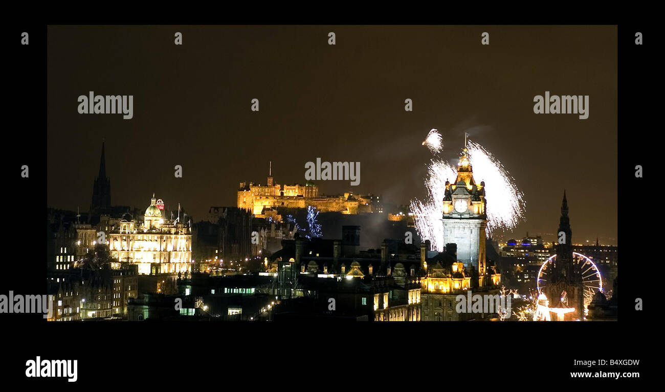 Fireworks explode over Edinburgh as the city centre Christmas lights