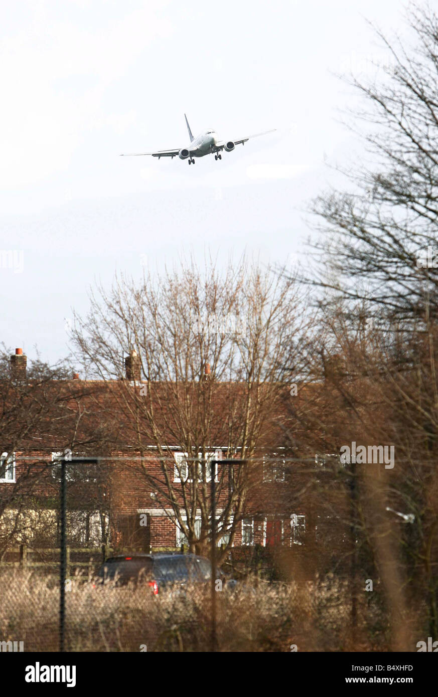 Aircraft struggle to keep level position on approach to Manchester Airport where several planes aborted landing to try again after getting blown off course of the runway.;11th January 2007 Stock Photo