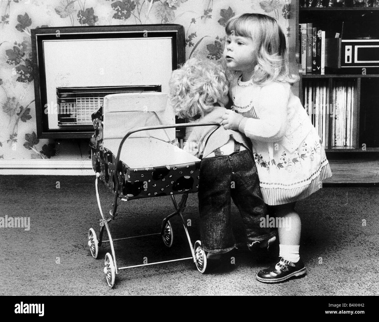 Doll pram girl hi res stock photography and images Alamy