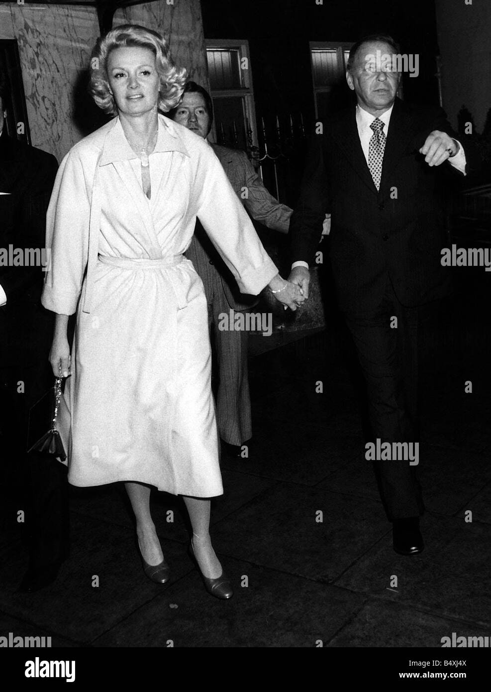 Frank Sinatra hand in hand with girlfriend in London Stock Photo Alamy