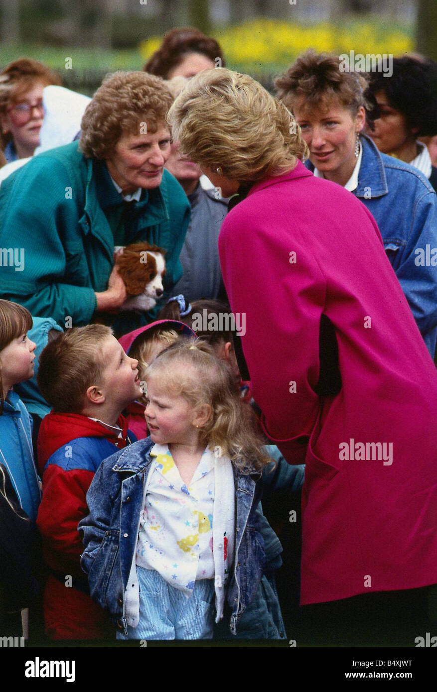 Princess Diana Princess of Wales August 1989 talking to a woman in the crowd on a visit to Aberdeen red jacket Princess Diana Scotland Stock Photo