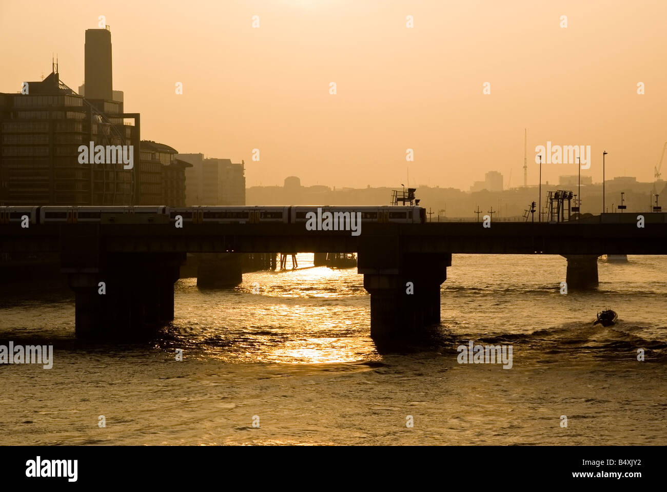 London skyline on the river thames at sunset Stock Photo