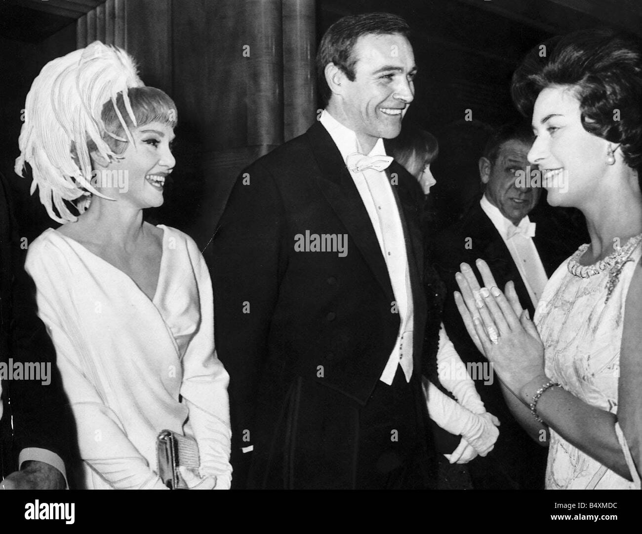 Sean Connery actor with wife Diane Cilento meeting Princess Margaret London premiere film movie Lord Jim Stock Photo