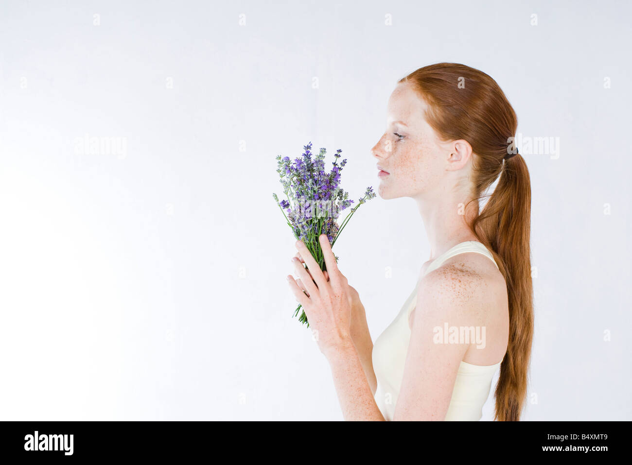 young woman with lavender Stock Photo