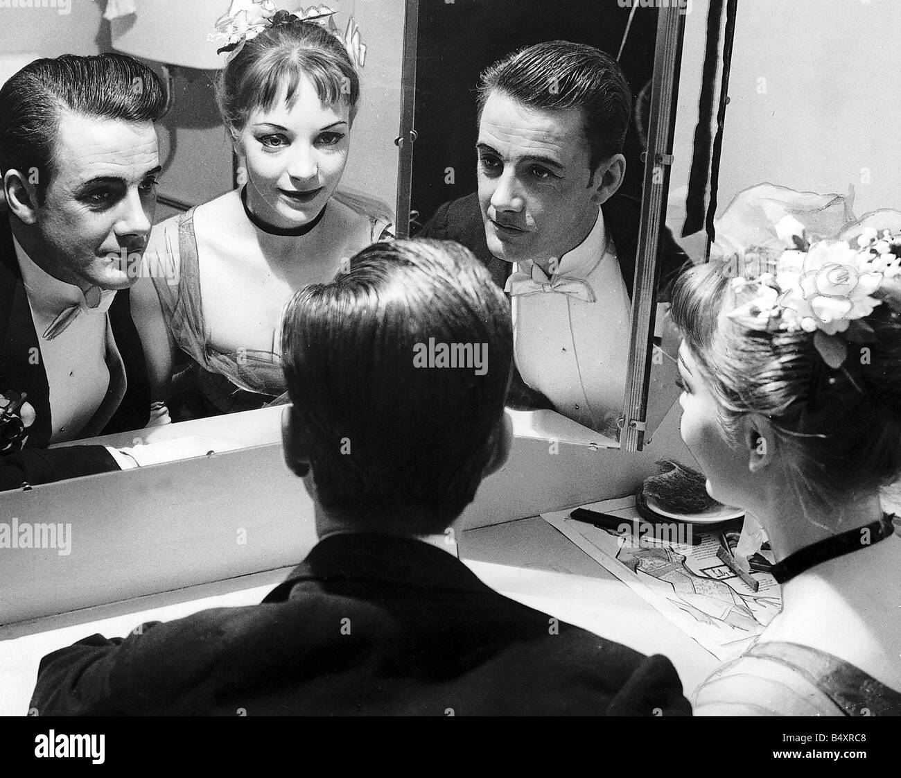 Fulton MacKay actor with Jocelyn Brittonin dressing room looking mirror prepairing for Ring Round the Moon play at Citizens Theatre Glasgow Stock Photo