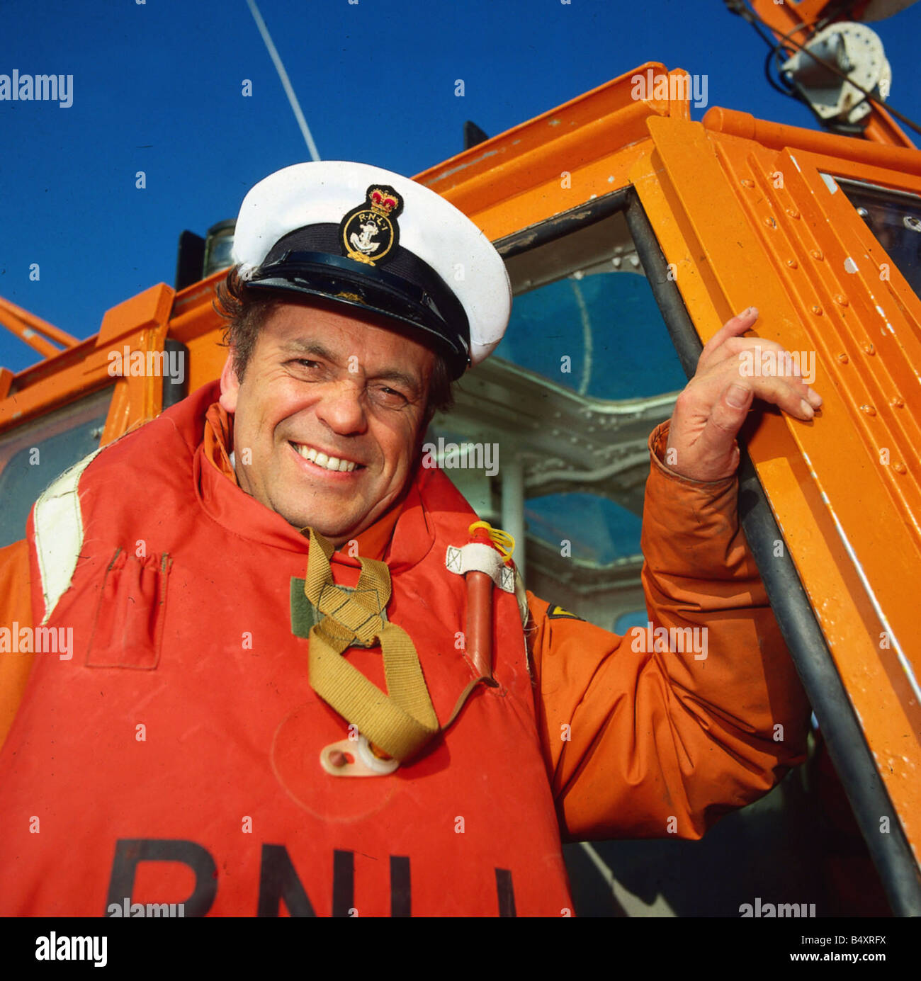 Madoc Philip Madoc on ship's bow wearing cap April 1981 Stock Photo - Alamy
