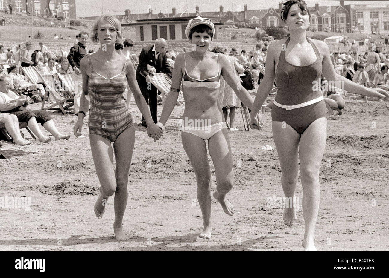 Czech workers at Britain s Butlins Camp Barry Women Holidaymakers wearing  swimming costumes bathing suits bikinis Holidays in Britain Sunbathing  August 1962 Stock Photo - Alamy
