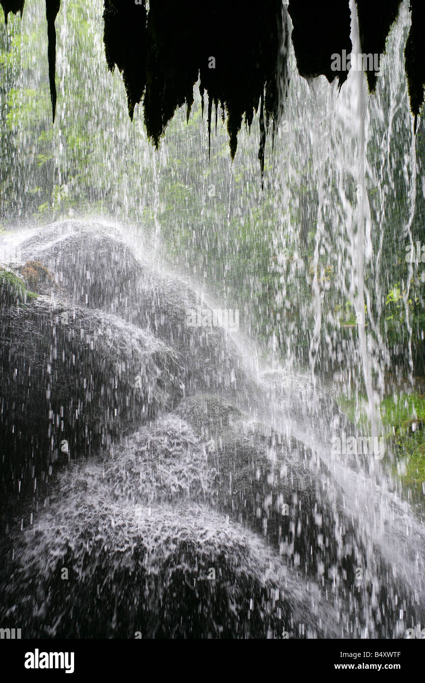 Heavy rain flowing over stones, closeup Stock Photo Alamy