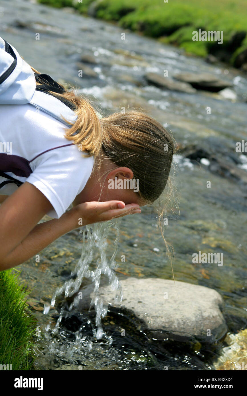 Child washing hair river hi-res stock photography and images - Alamy