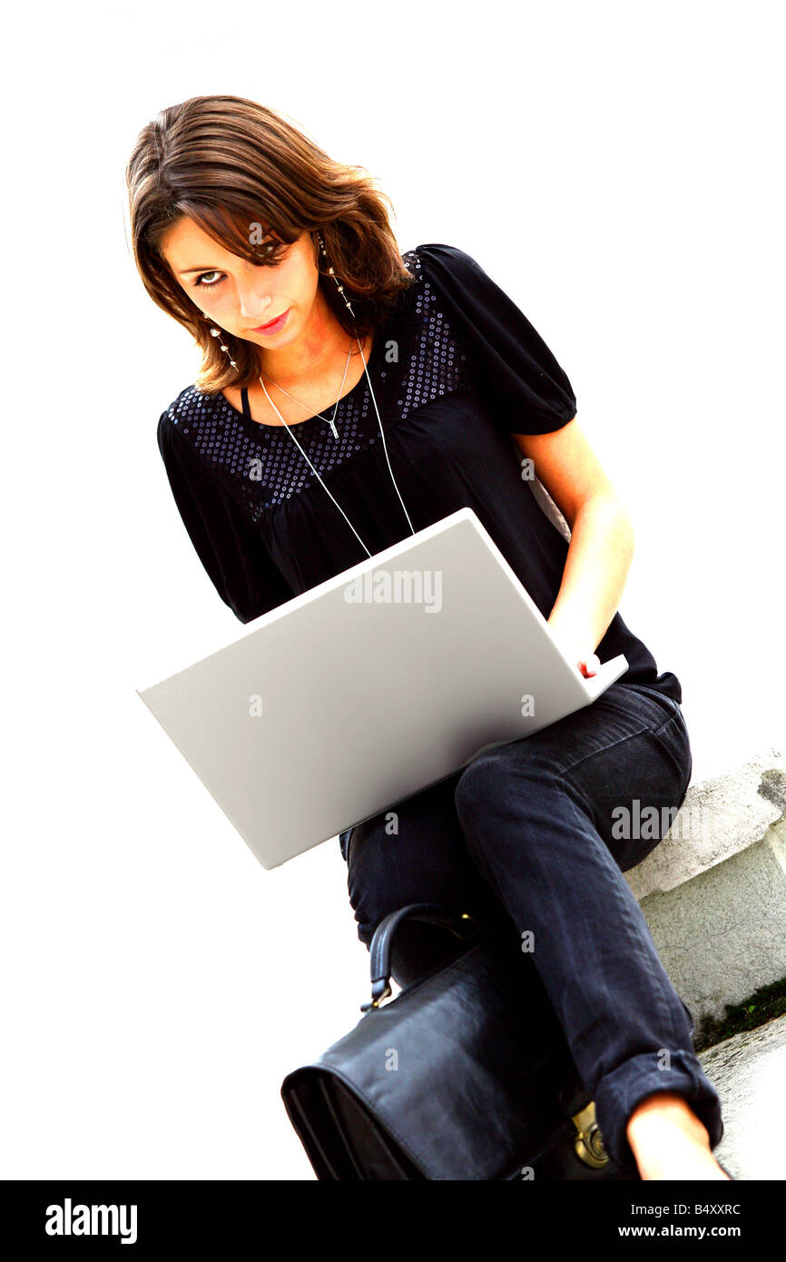 Young woman using laptop Stock Photo - Alamy