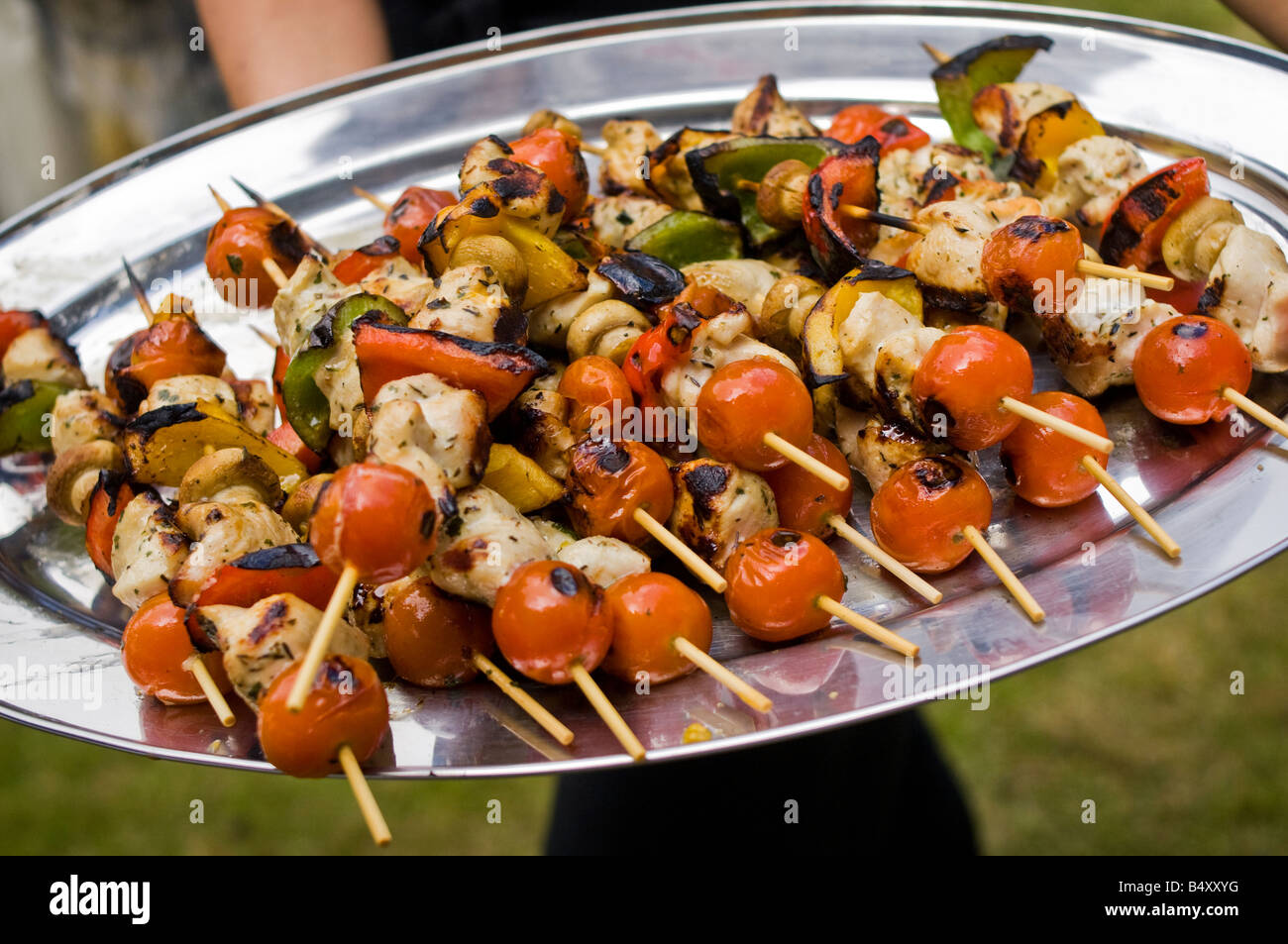 Plate of cooked barbecued kebabs food. Stock Photo