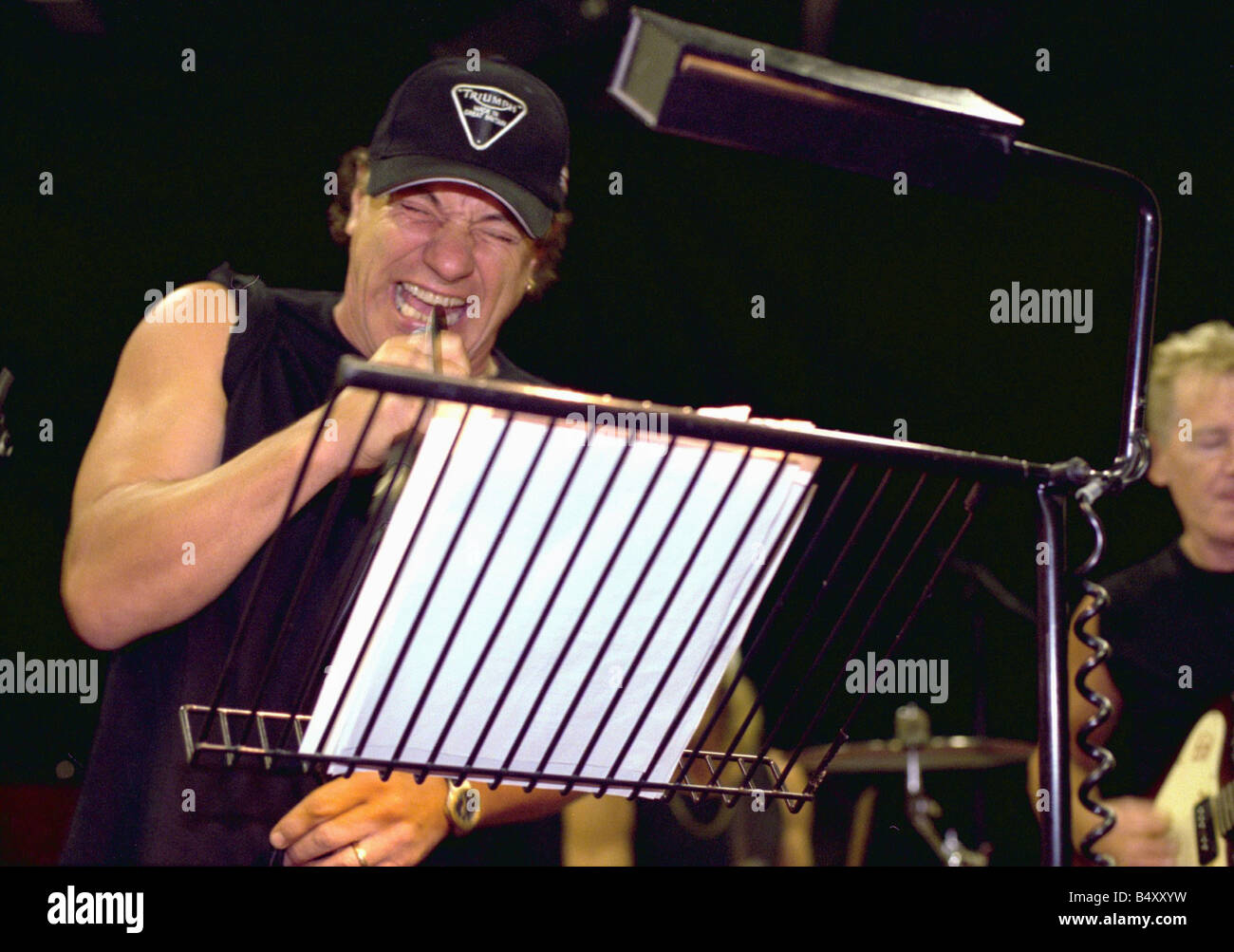 Brian Johnson lead singer of the rock group AC DC rehearsing with his ...