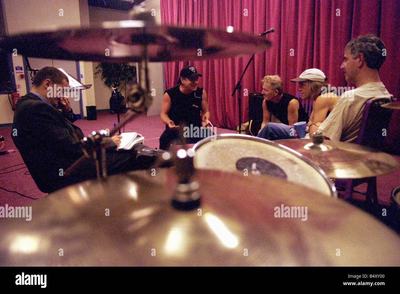 Brian Johnson lead singer of the rock group AC DC rehearsing with his ...