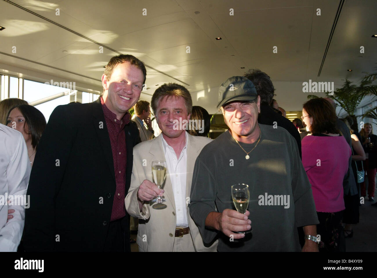 Actor Kevin Whately DJ Paddy MacDee and Brian Johnson lead singer of the rock group AC DC at the preview night of the Baltic Arts Centre Stock Photo