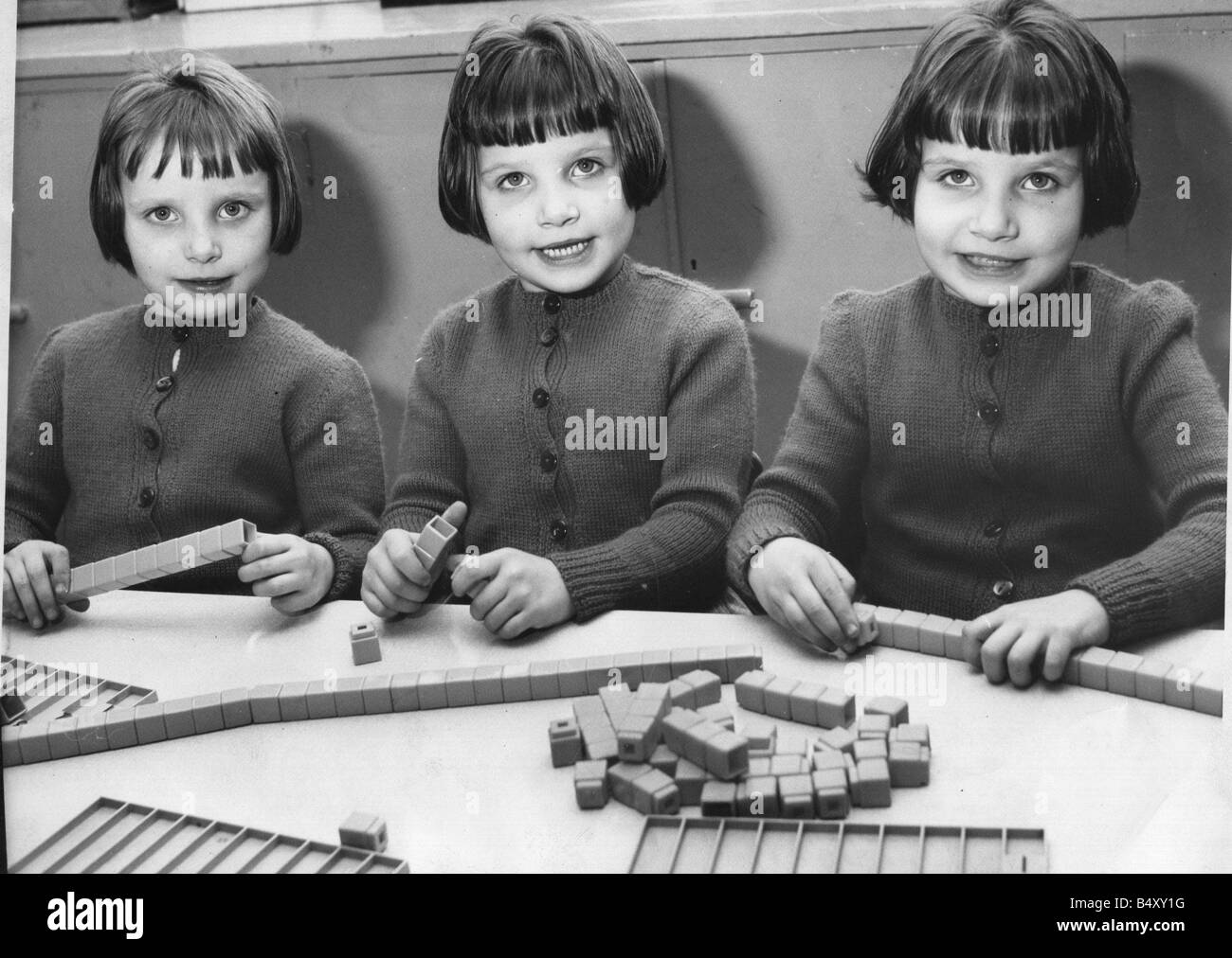 The Ross triplets of Aldwick Road Denton Burn Newcastle left to right Gillian Brenda and Kathleen who are five years old at St Bede s School Whickham View Newcastle Stock Photo