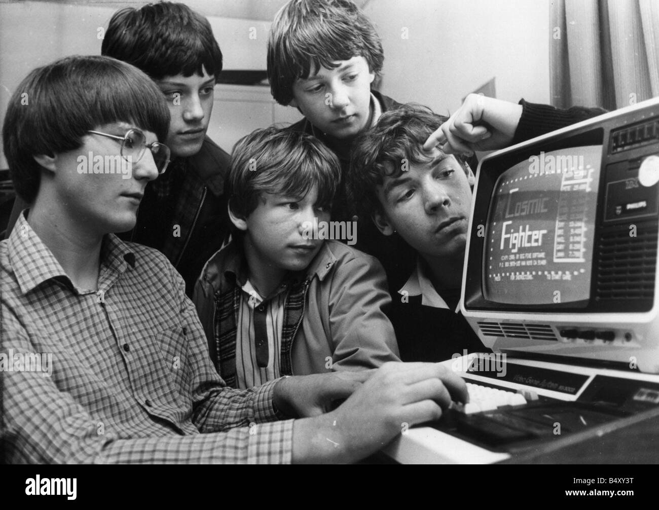 Children using computers Computer crazy schoolboys Andy Stoneman Luke Youll John Shaw David Graham and Steven Iveson of Slatyford Comprehensive School 1981 Stock Photo