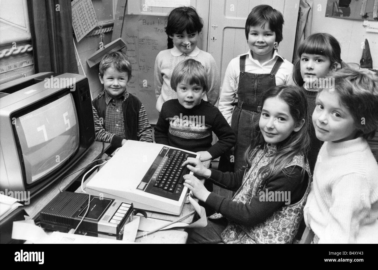 Children using computers Schoolchildren at the computer at Combo First School near Morpeth in 1983 are left to right Michael Aynsley Becky Rostron Tom Anderson Tracey Telfer Eleanor Aynsley Sorrel Peckham at the keyboard and Leonie Henderson Stock Photo