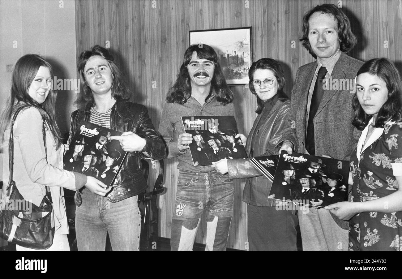 Geordie the former band of Brian Johnson lead singer of the rock group AC  DC Tom Hill 2nd from left Brian Gibson centre giving away copies of the  group s album to