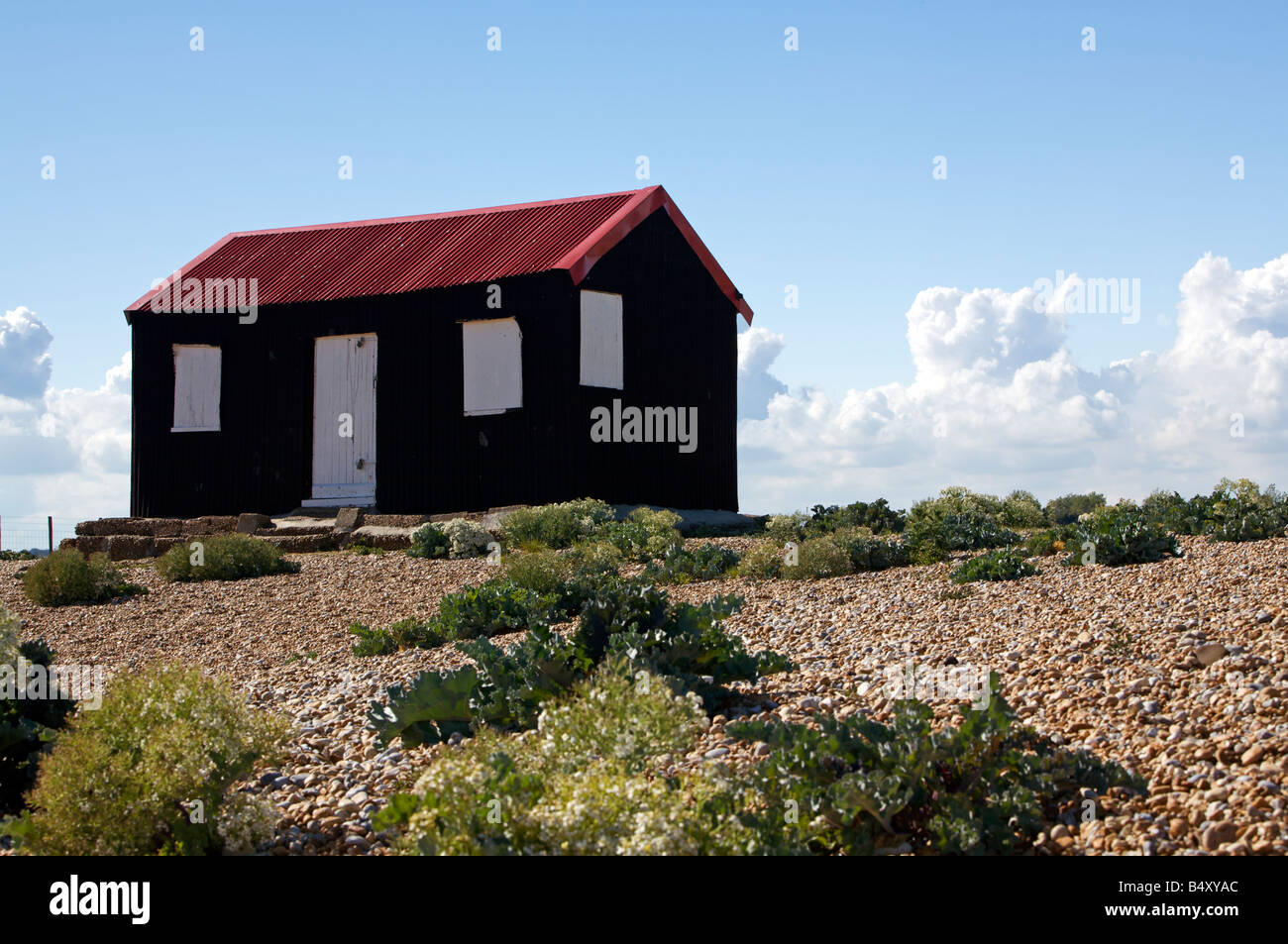 Red Rise Hut a hut with a red roof at Rye Harbour Stock Photo - Alamy