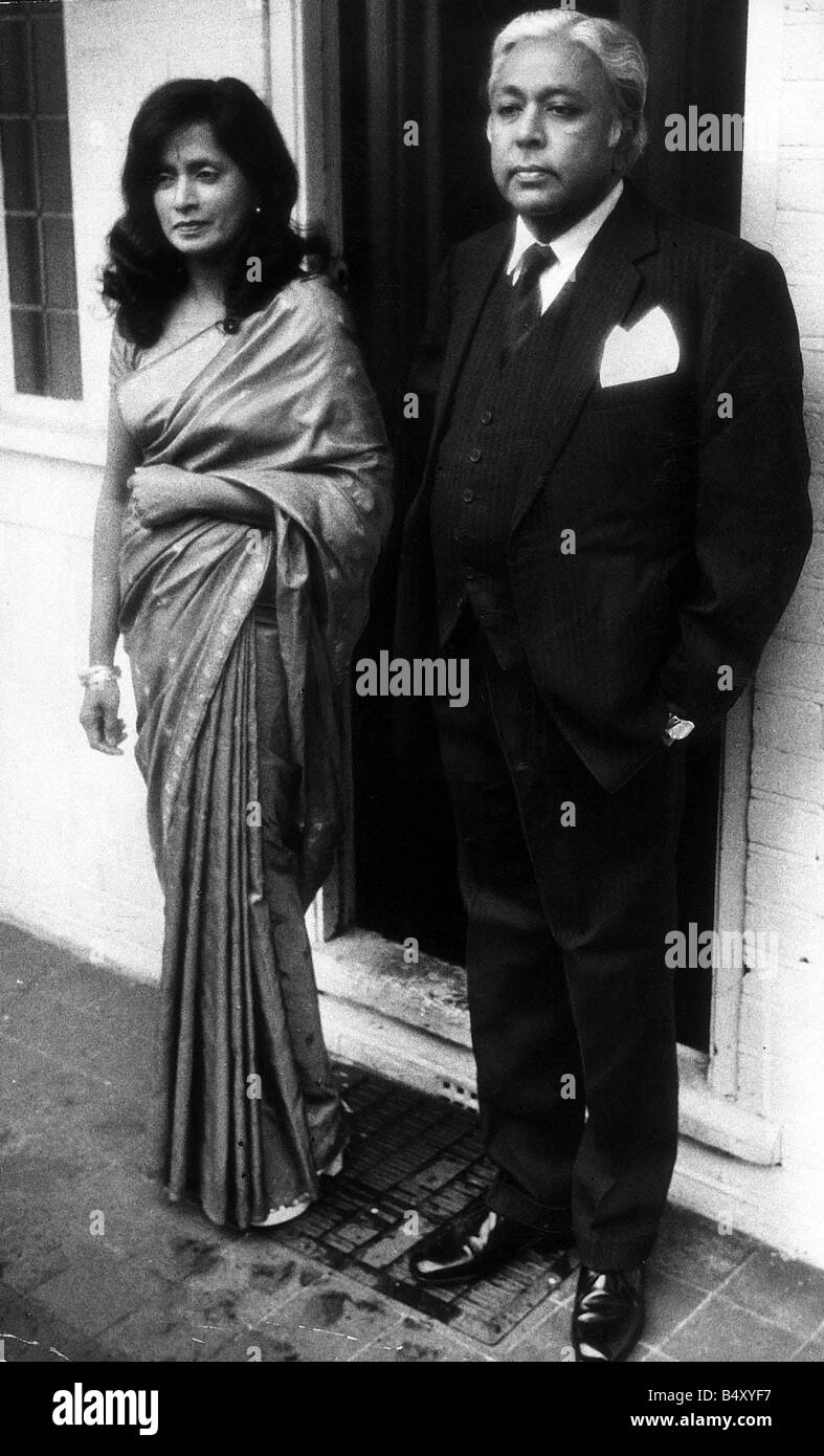 Oct 1974 Dr Emil Savundra aged 50 former head of the fire Auto and Marine Insurance jailed for issuing a forged security note and making a false entry in a balance sheet seen here on his release from Wormwood Scrubs Prison with wife Pushram Savundra wearing a sari Stock Photo