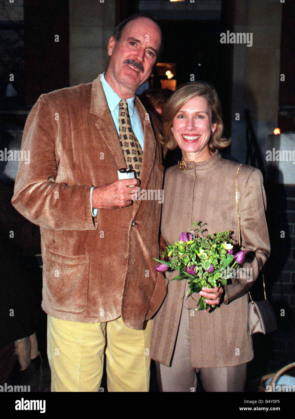 John Cleese and wife arrive for Michael Winners birthday party Stock Photo