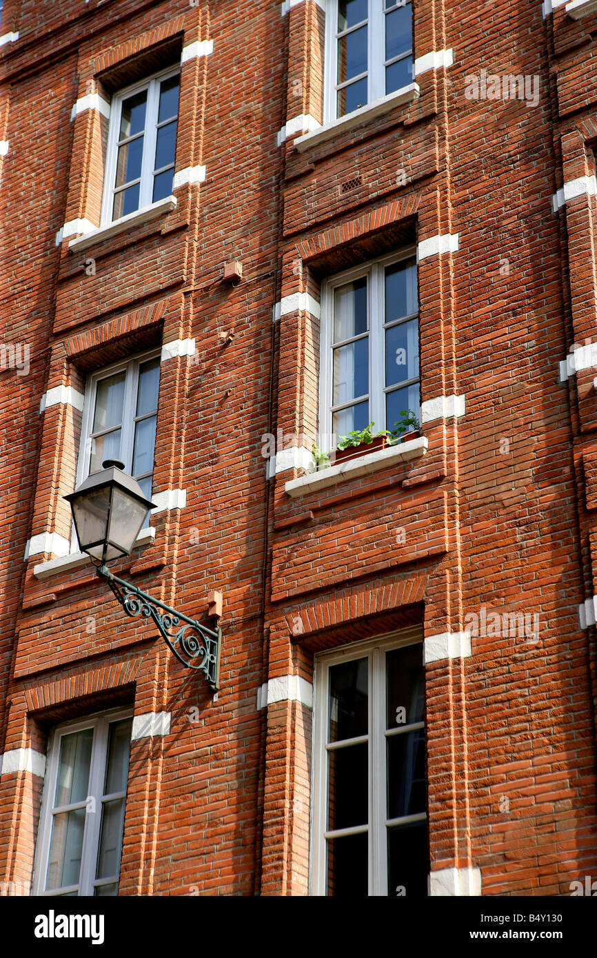 Building with windows and street light, low angle view Stock Photo - Alamy